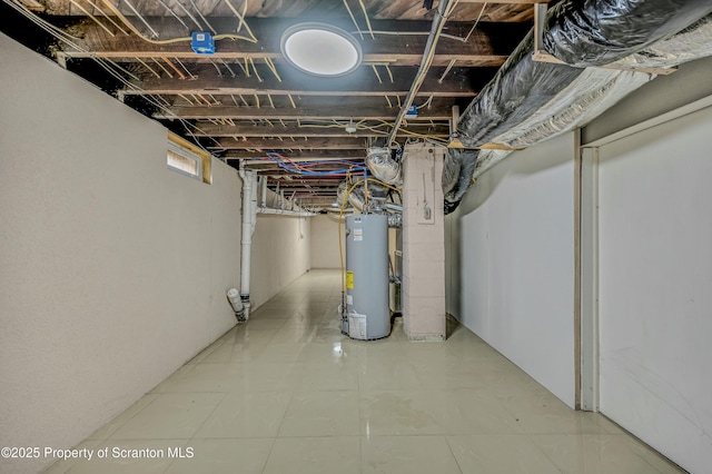 below grade area featuring water heater