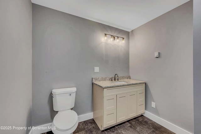 40 Honey Bear Rd, Lake Ariel, PA 18436 - bathroom with toilet, baseboards, and vanity