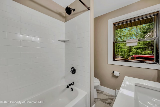 40 Honey Bear Rd, Lake Ariel, PA 18436 - bathroom featuring toilet, marble finish floors, baseboards, and bathtub / shower combination