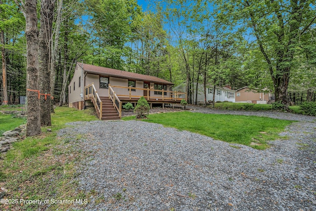 40 Honey Bear Rd, Lake Ariel, PA 18436 - view of front of home with a deck, a front lawn, and stairs