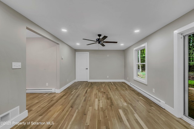 40 Honey Bear Rd, Lake Ariel, PA 18436 - empty room with a baseboard radiator, a baseboard heating unit, plenty of natural light, light wood finished floors, and recessed lighting