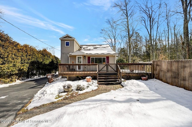 view of front of home with a wooden deck