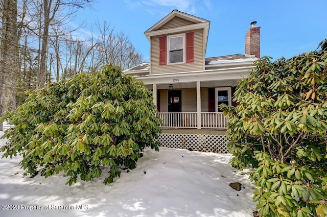 view of front of property featuring covered porch