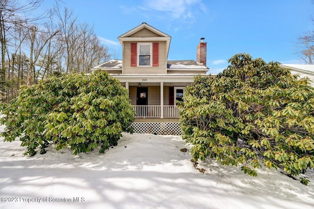 view of front of home featuring covered porch