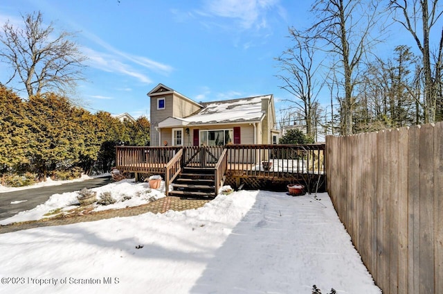 view of front of house with a deck