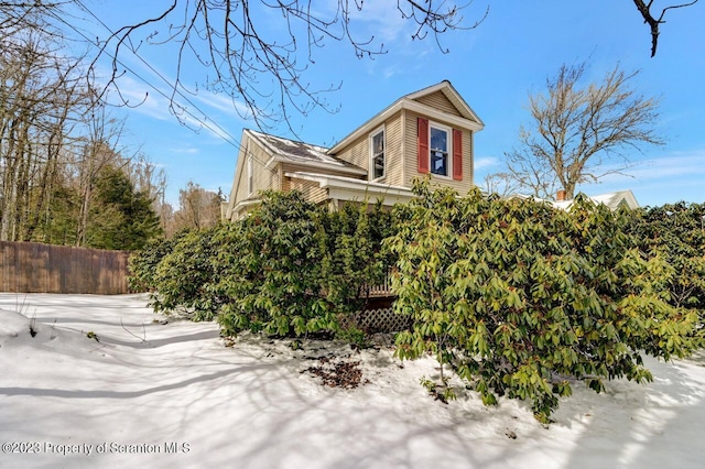 view of snow covered property