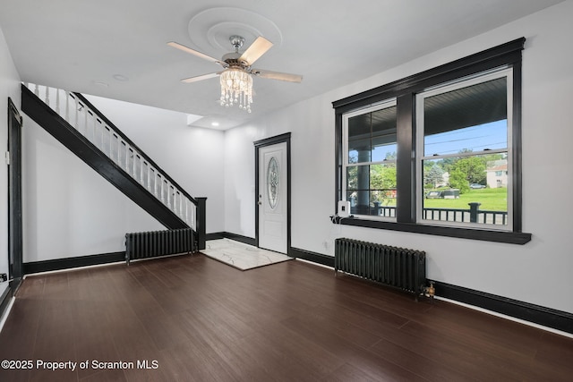 1210 N N Main Ave, Scranton, PA 18508 - entrance foyer with radiator heating unit, wood finished floors, and a ceiling fan