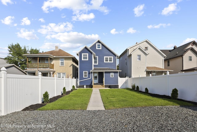 1210 N N Main Ave, Scranton, PA 18508 - rear view of house with a fenced backyard and a residential view