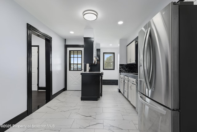 1210 N N Main Ave, Scranton, PA 18508 - kitchen with stainless steel fridge with ice dispenser, light marble finish flooring, extractor fan, recessed lighting, and decorative backsplash