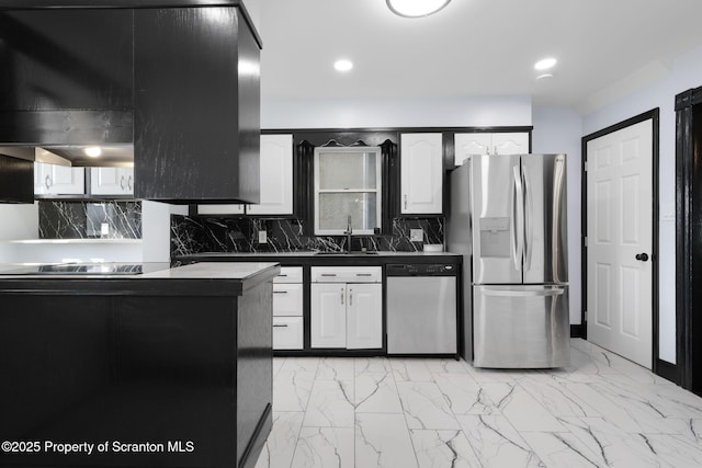 1210 N N Main Ave, Scranton, PA 18508 - kitchen featuring appliances with stainless steel finishes, light marble finish floors, tasteful backsplash, and recessed lighting