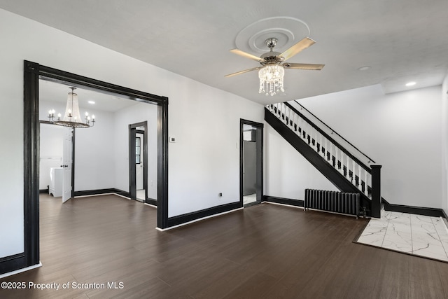 1210 N N Main Ave, Scranton, PA 18508 - unfurnished living room featuring wood finished floors, ceiling fan, radiator, a chandelier, and recessed lighting