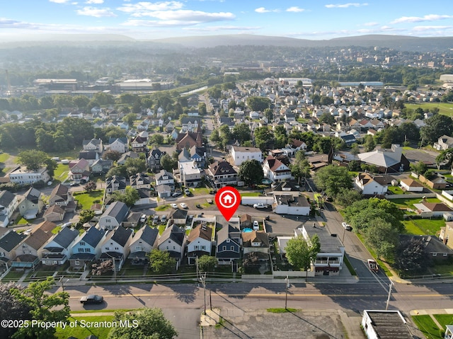 1210 N N Main Ave, Scranton, PA 18508 - aerial view of property and surrounding area with a mountain backdrop and nearby suburban area