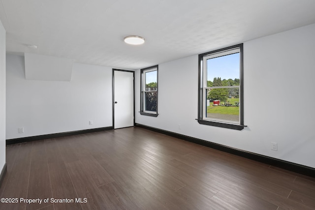 1210 N N Main Ave, Scranton, PA 18508 - spare room with dark wood-style floors and a smoke detector
