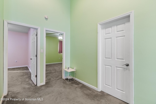 hallway with light carpet