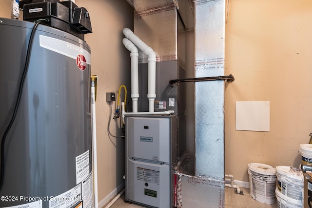 utilities featuring heating unit and gas water heater