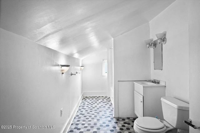 1017 W Market St, Scranton, PA 18508 - full bath featuring vanity, lofted ceiling, tile patterned floors, and tub / shower combination