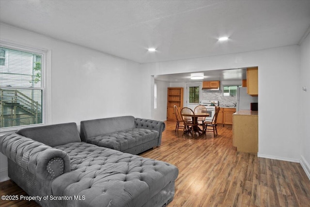 1017 W Market St, Scranton, PA 18508 - living room with wood finished floors, healthy amount of natural light, and recessed lighting