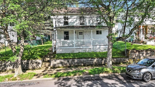 1017 W Market St, Scranton, PA 18508 - view of front of home with covered porch and a front yard