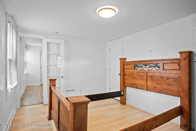 1017 W Market St, Scranton, PA 18508 - bedroom featuring light wood-style flooring and baseboards