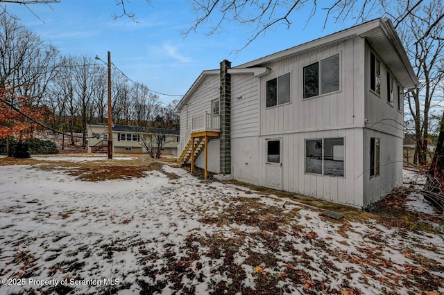 view of snow covered property