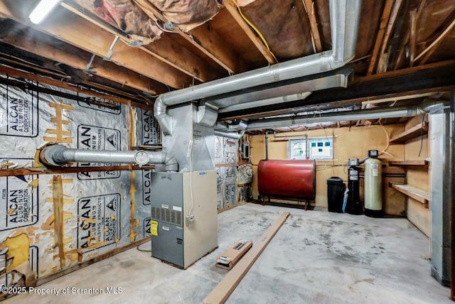 basement featuring heating unit