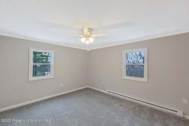 carpeted spare room with ceiling fan, ornamental molding, and baseboard heating