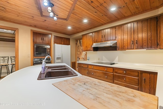 kitchen featuring wooden ceiling, sink, and black appliances