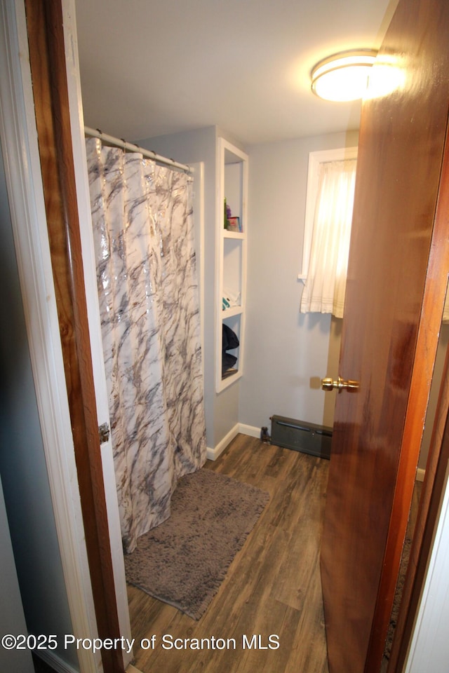 528 Hemlock St, Scranton, PA 18505 - bathroom with wood finished floors, baseboards, and a shower with curtain