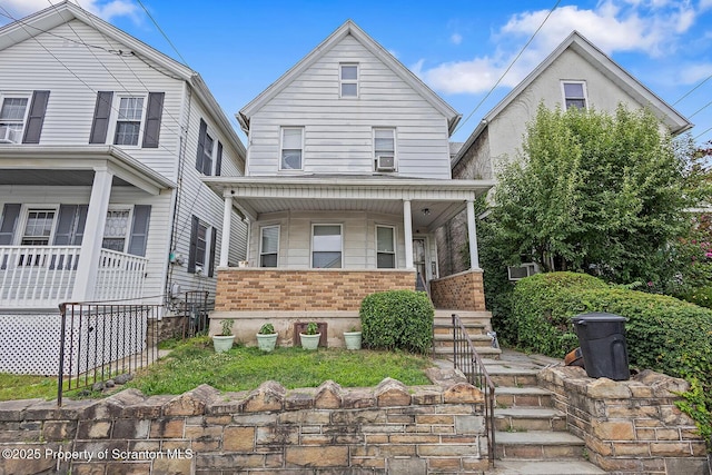 1004 Prospect Ave, Scranton, PA 18505 - traditional style home featuring a porch and brick siding
