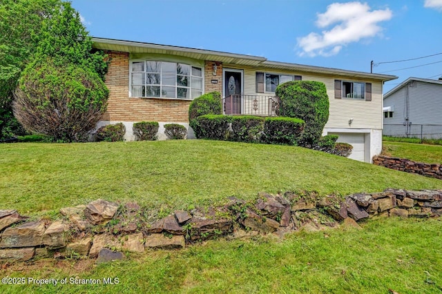 226 Linda Ln, Scranton, PA 18504 - ranch-style home featuring brick siding, a garage, and a front lawn