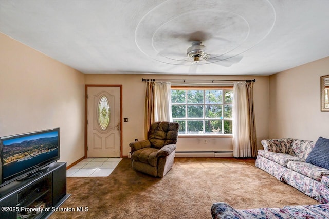 226 Linda Ln, Scranton, PA 18504 - carpeted living room featuring a baseboard heating unit and ceiling fan