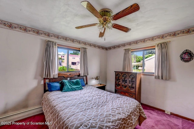 226 Linda Ln, Scranton, PA 18504 - carpeted bedroom featuring baseboard heating and a ceiling fan