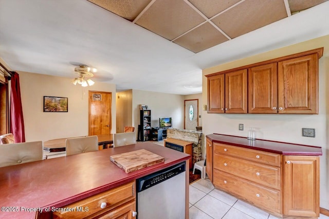 226 Linda Ln, Scranton, PA 18504 - kitchen featuring dishwasher, open floor plan, ceiling fan, light tile patterned floors, and brown cabinets