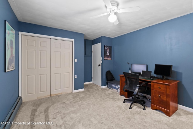 carpeted office with a baseboard radiator and ceiling fan