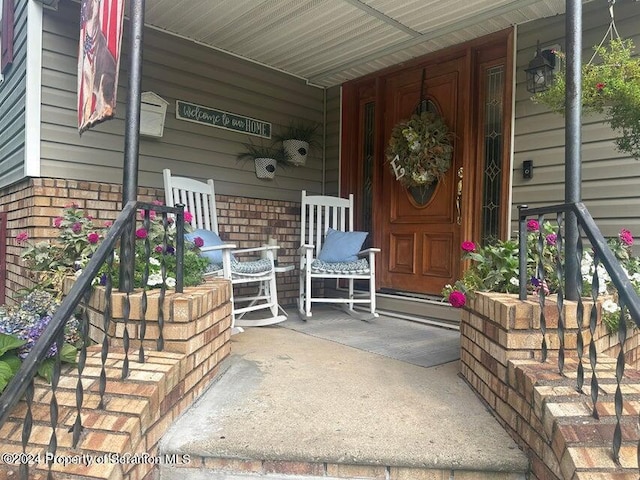 entrance to property with a porch