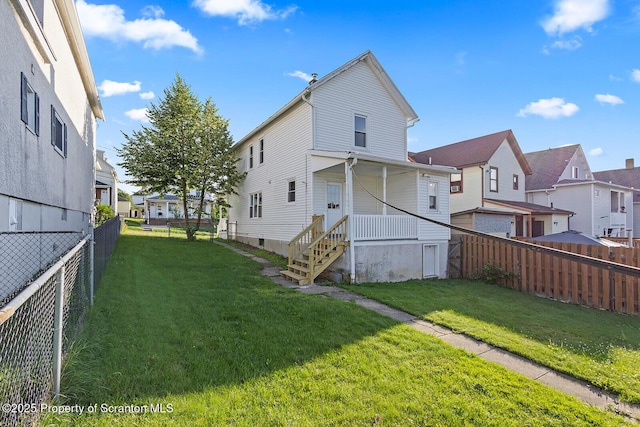 1324 Dartmouth St, Scranton, PA 18504 - rear view of house featuring a residential view and a fenced backyard