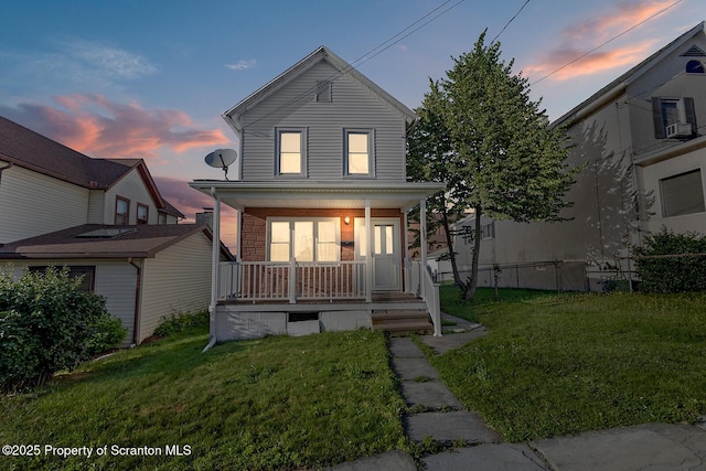 1324 Dartmouth St, Scranton, PA 18504 - traditional-style home featuring covered porch and a yard