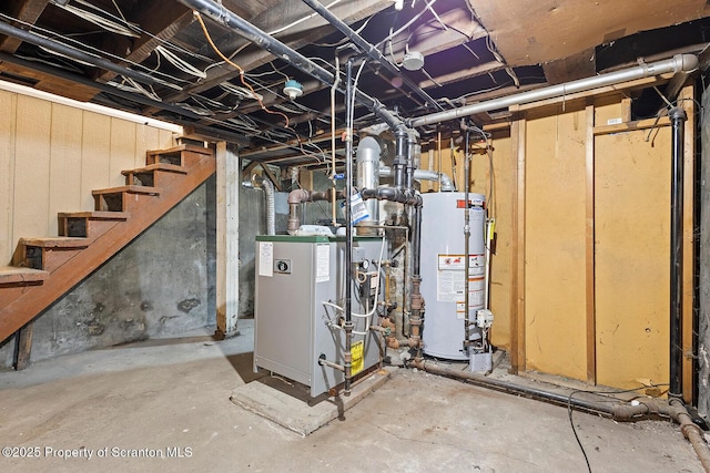 1324 Dartmouth St, Scranton, PA 18504 - unfinished below grade area featuring water heater, a heating unit, and stairway