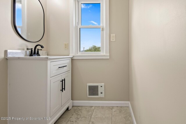1324 Dartmouth St, Scranton, PA 18504 - bathroom with marble look tile flooring and vanity