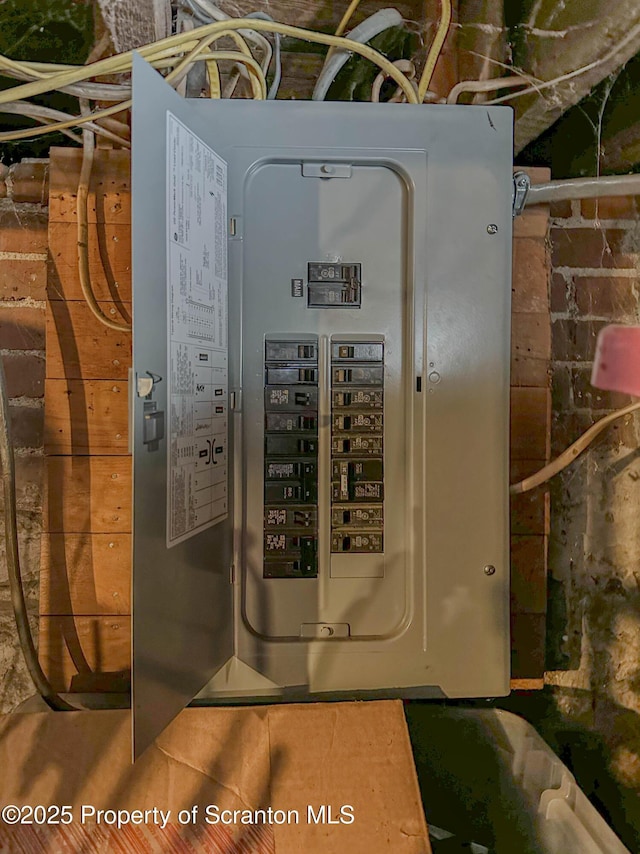 utility room featuring electric panel