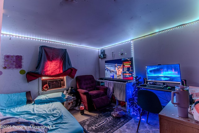 bedroom featuring cooling unit