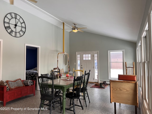 dining area with a baseboard radiator, ceiling fan, and high vaulted ceiling