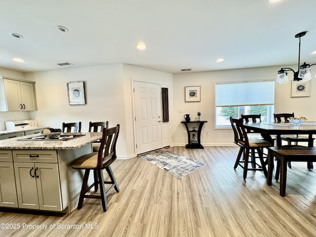 dining room featuring light hardwood / wood-style floors