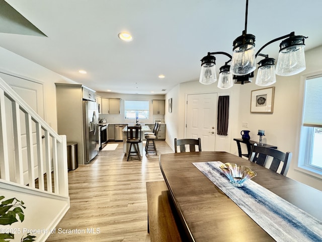 dining area with light wood-type flooring