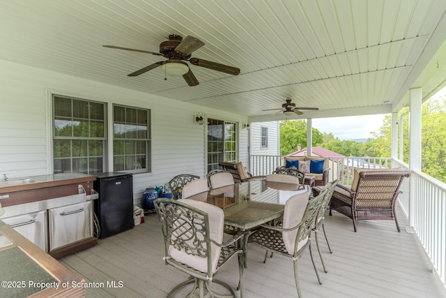 99 Elizabeth Ave, Hallstead, PA 18822 - deck featuring outdoor dining area and a ceiling fan