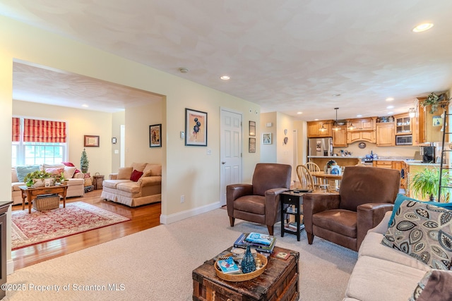 99 Elizabeth Ave, Hallstead, PA 18822 - living room with light colored carpet, recessed lighting, baseboards, and light wood-style floors
