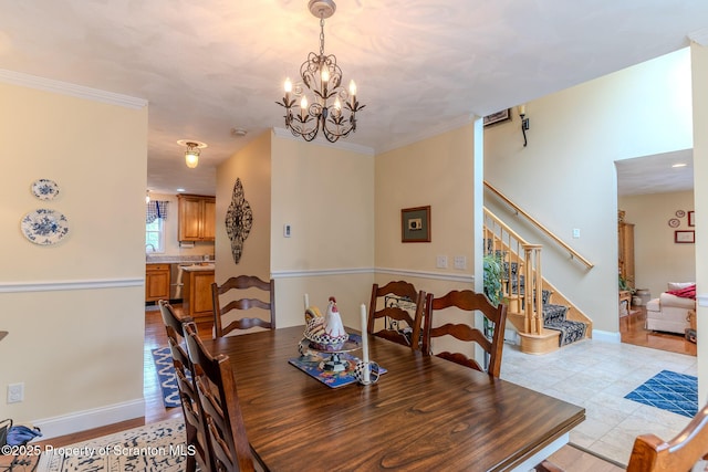 99 Elizabeth Ave, Hallstead, PA 18822 - dining space featuring stairway, a chandelier, baseboards, and tile patterned flooring