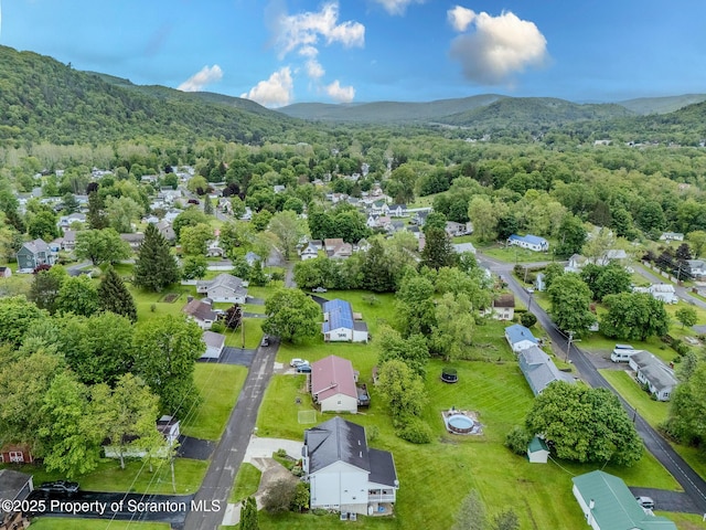99 Elizabeth Ave, Hallstead, PA 18822 - aerial perspective of suburban area with a mountainous background and a heavily wooded area