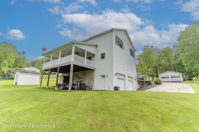 99 Elizabeth Ave, Hallstead, PA 18822 - back of house featuring a ceiling fan, a yard, an outbuilding, and cooling unit