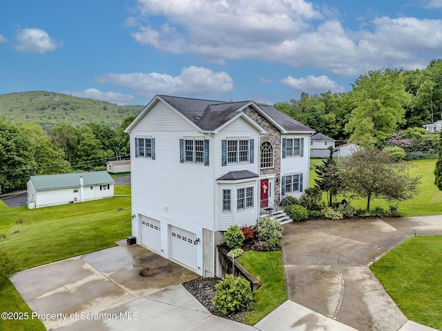 99 Elizabeth Ave, Hallstead, PA 18822 - view of front of property with concrete driveway, an attached garage, a front lawn, and roof with shingles